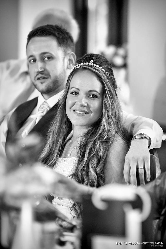 The Bride listens on intently to her father on her wedding day - Karl Drage, Raunds wedding photographer.