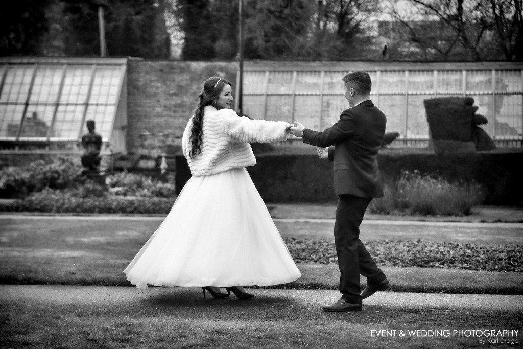 The bride and groom dance in the Walled Garden at Delapre Abbey on their wedding day.