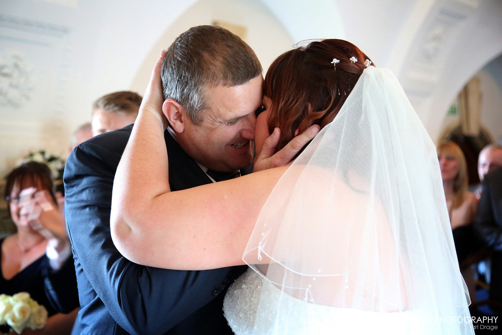 You may kiss the bride - by Rutland wedding photographer Karl Drage