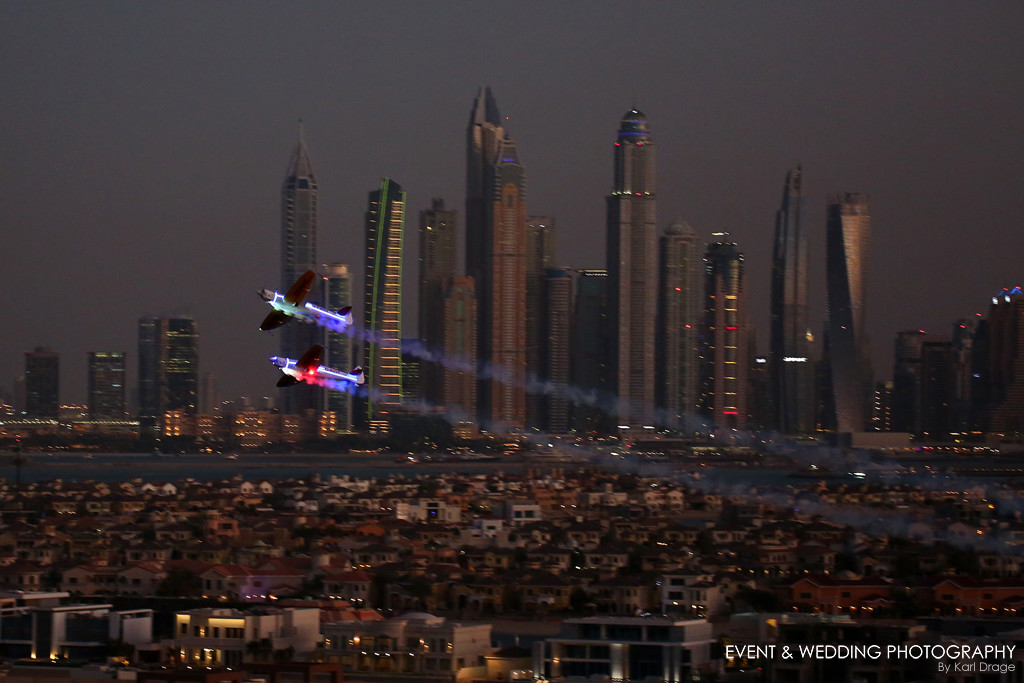 Twister Aerobatics Team passes in front of the Dubai Marina skyline