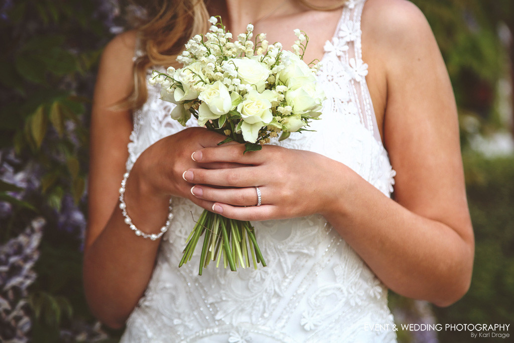 White spray roses and lily of the valley - Bridal bouquet by Rockingham Flowers