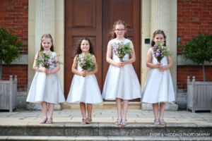 Image showing four flower girls on the steps of Kelmarsh Hall