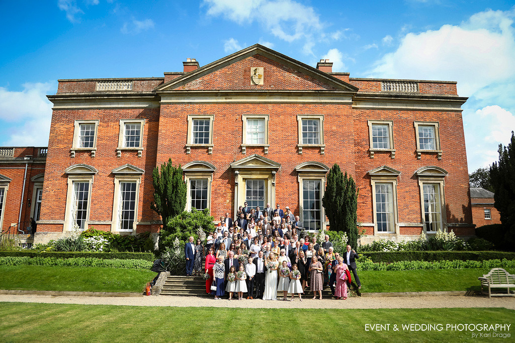 Large group shot of guests at a Kelmarsh Hall wedding