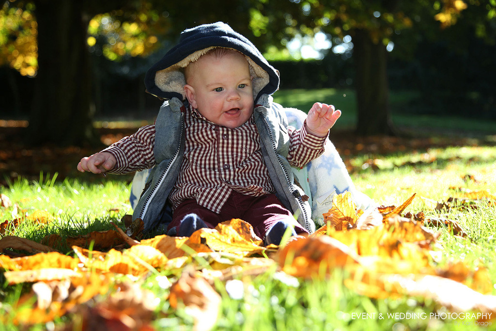 Playing in the leaves at Sywell Country Park