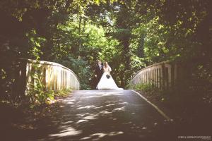 Image showing bride and groom on a bridge near Oundle, Northants