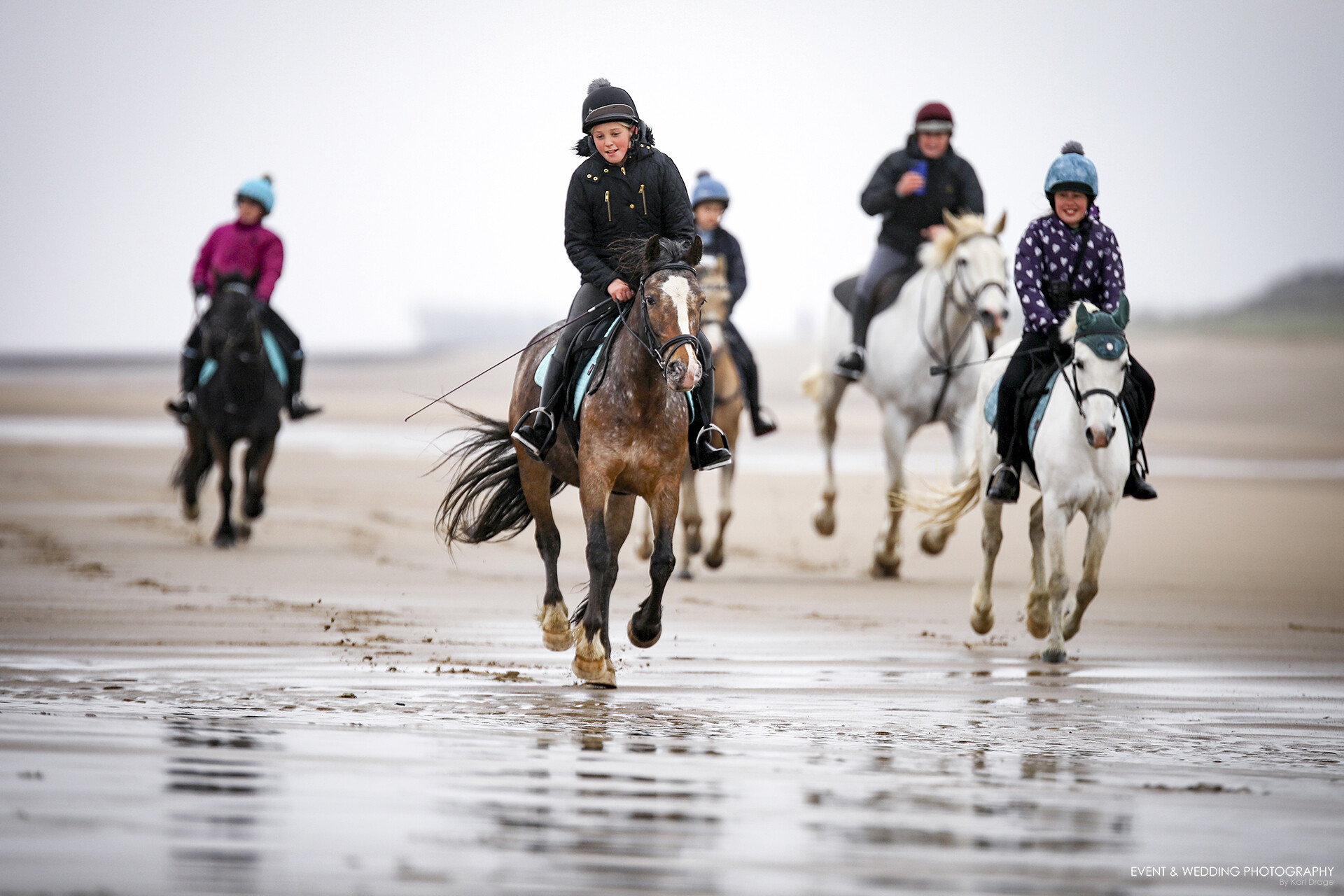 Horses hacking along Wolla Bank Beach