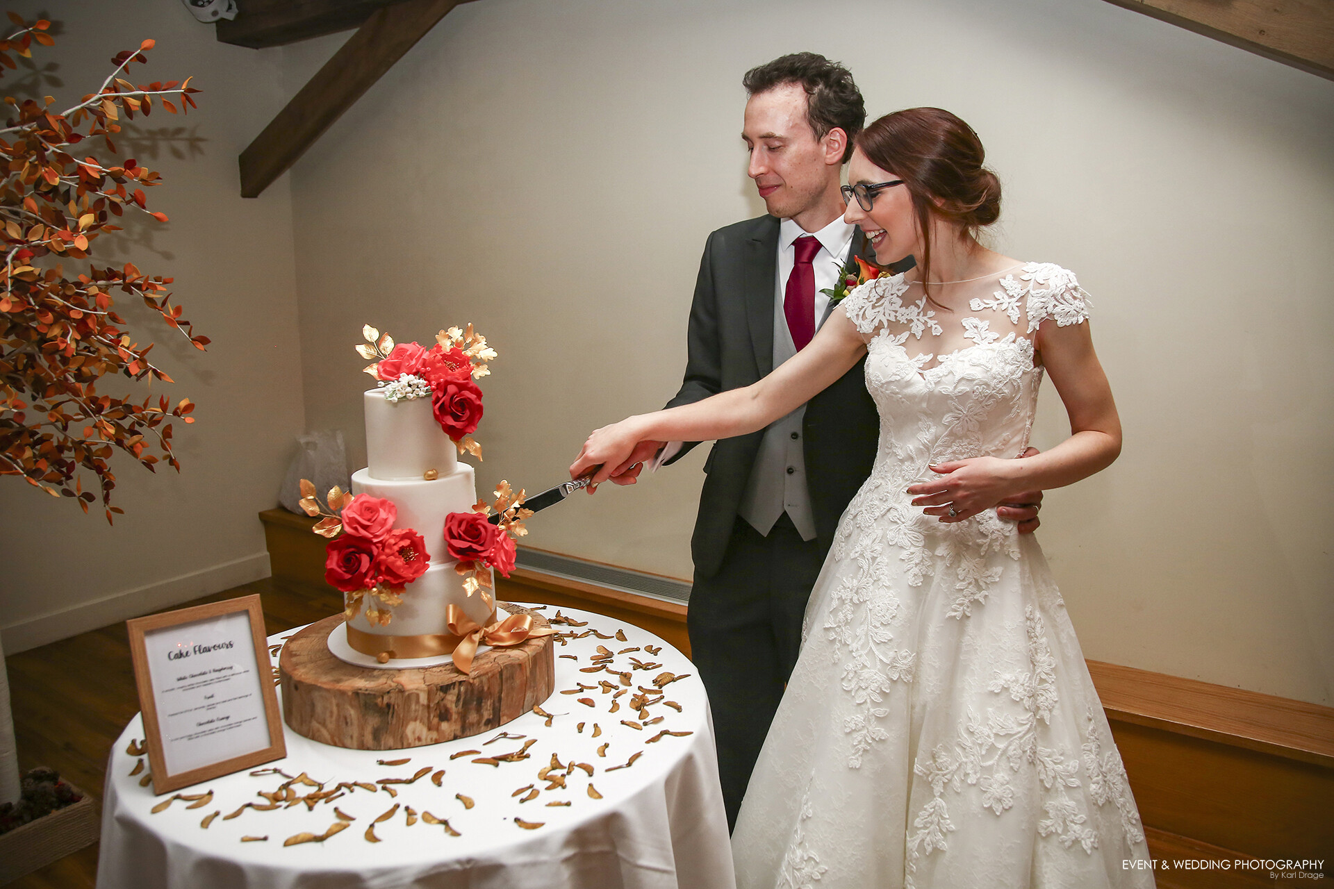 The Bride & Groom cut into their wedding cake
