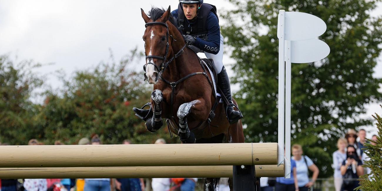 Wills Oakden & Oughterard Cooley fly Herbert's Hollow at the 2022 Land Rover Burghley Horse Trials