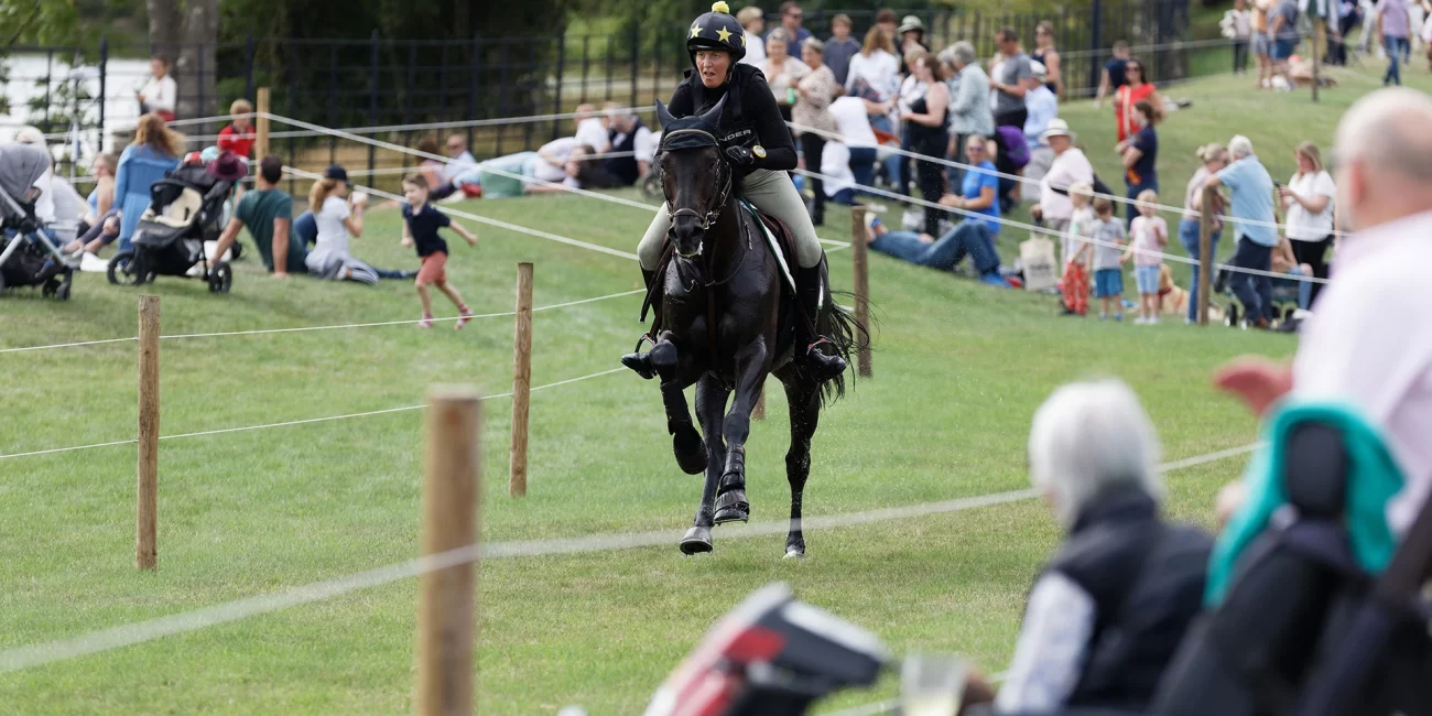 Helen Wilson & My Ernie approach Lion Bridge at the 2022 Land Rover Burghley Horse Trials.