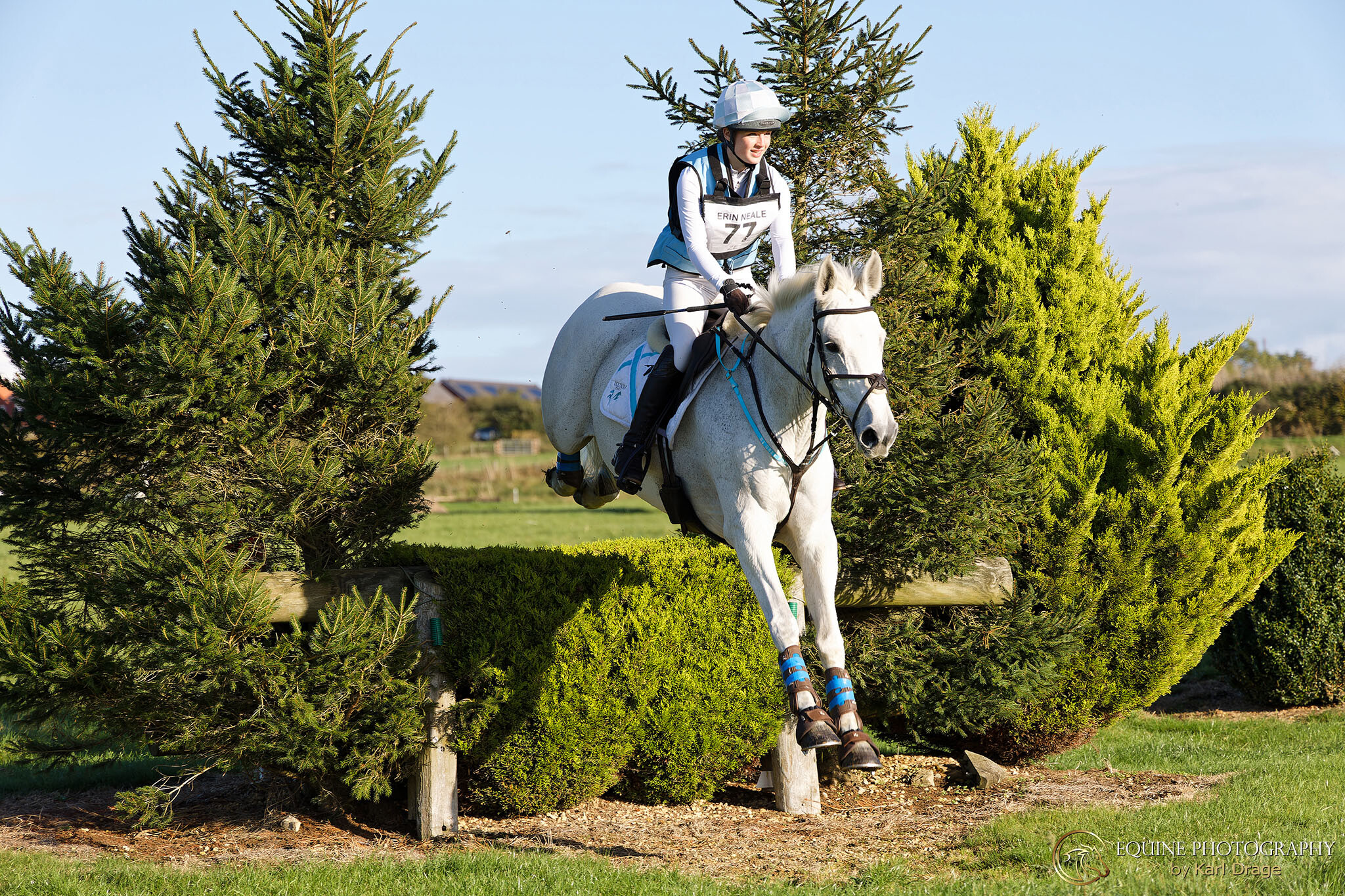Erin Neale and her horse fly the hedge during the Intermediate class at the H&P Equine Events Hunter Trial at Milton Keynes Equestrian Centre.